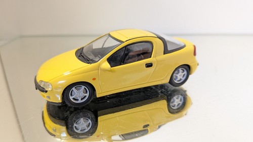 Schuco opel tigra yellow - 1:43,